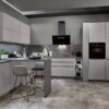 Nobilia Touch L-Küche Steingrau mit supermatter Front, Theke und Arbeitsplatte in Betonoptik